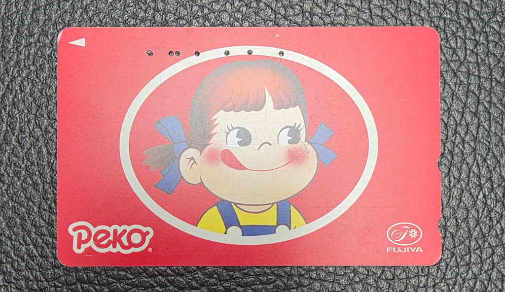 Vintage Fujiya Peko-chan Japanese Telephone Card 50 Units – Used Japan Candy Mascot Advertising Collectible